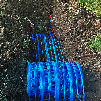 Grillage bleu avertisseur de présence d'une canalisation d'eau (alimentation en eau potable)