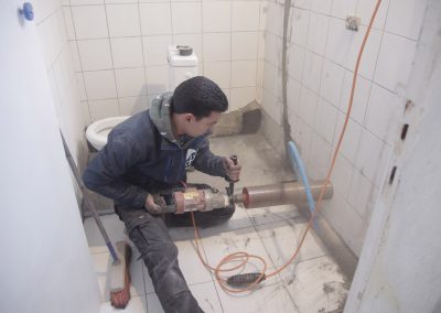 Percement d'un mur pour canalisation wc